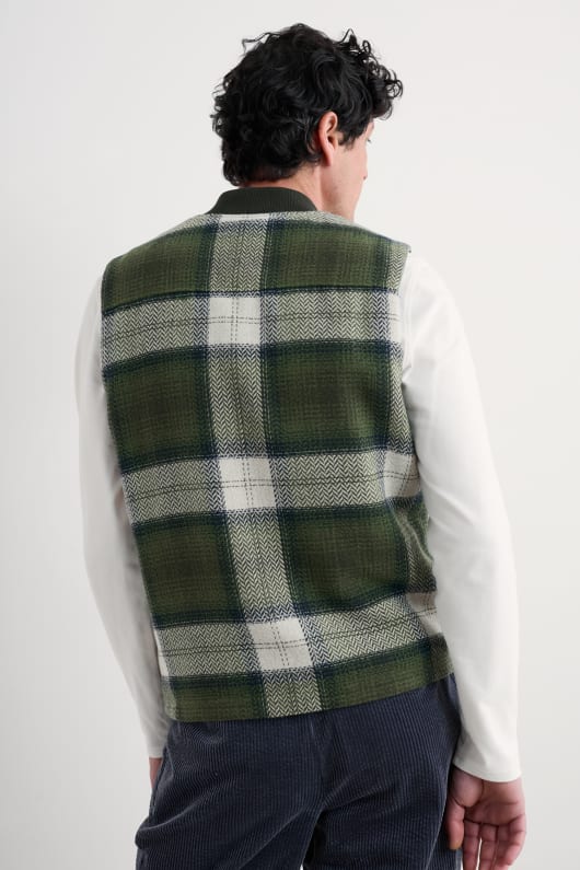 män caulker zip-väst