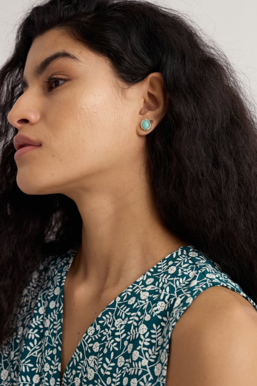 dewi mässing stud Örhängen